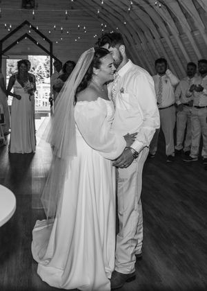 Candid photo of Bride and Groom laughing in Sherwood, MI