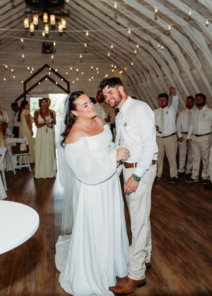 Candid photo of Bride and Groom laughing in Sherwood, MI
