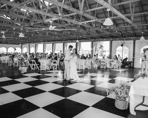 Black and white photo of bride and groom during first dance in Sherwood, MI