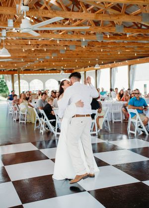 Bride and Groom kissing during first dance in Sherwood,MI