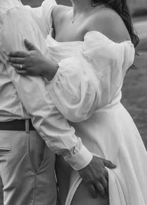 Bride and Groom in romantic pose at sunset in Sherwood,MI