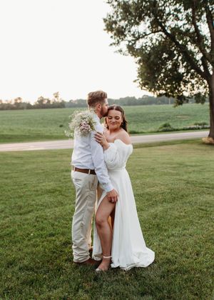 Bride and groom posed at sunset in Sherwood,MI