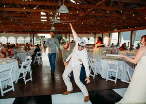 Groom and Bestman on the dance floor in Sherwood,MI
