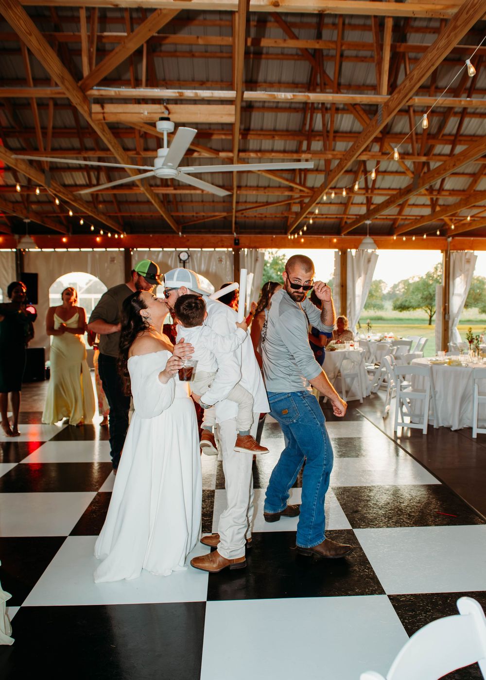 Bride and Groom kissing on the dance floor in Sherwood, MI
