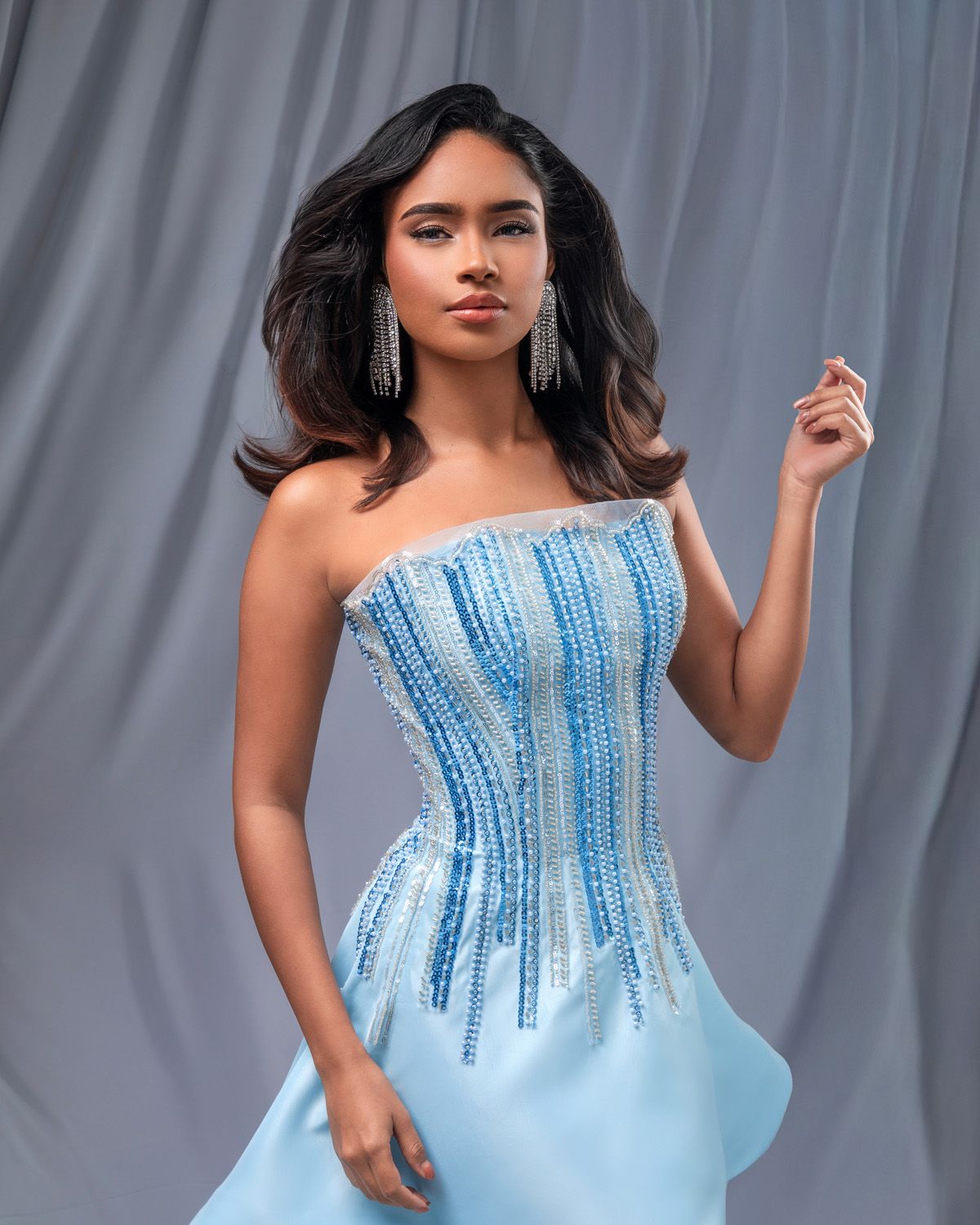 Caroline Porras, Miss Universe Bonaire 2026 in a light blue dress by Julio Mora captured by official pageant photographer Felicia Schuette