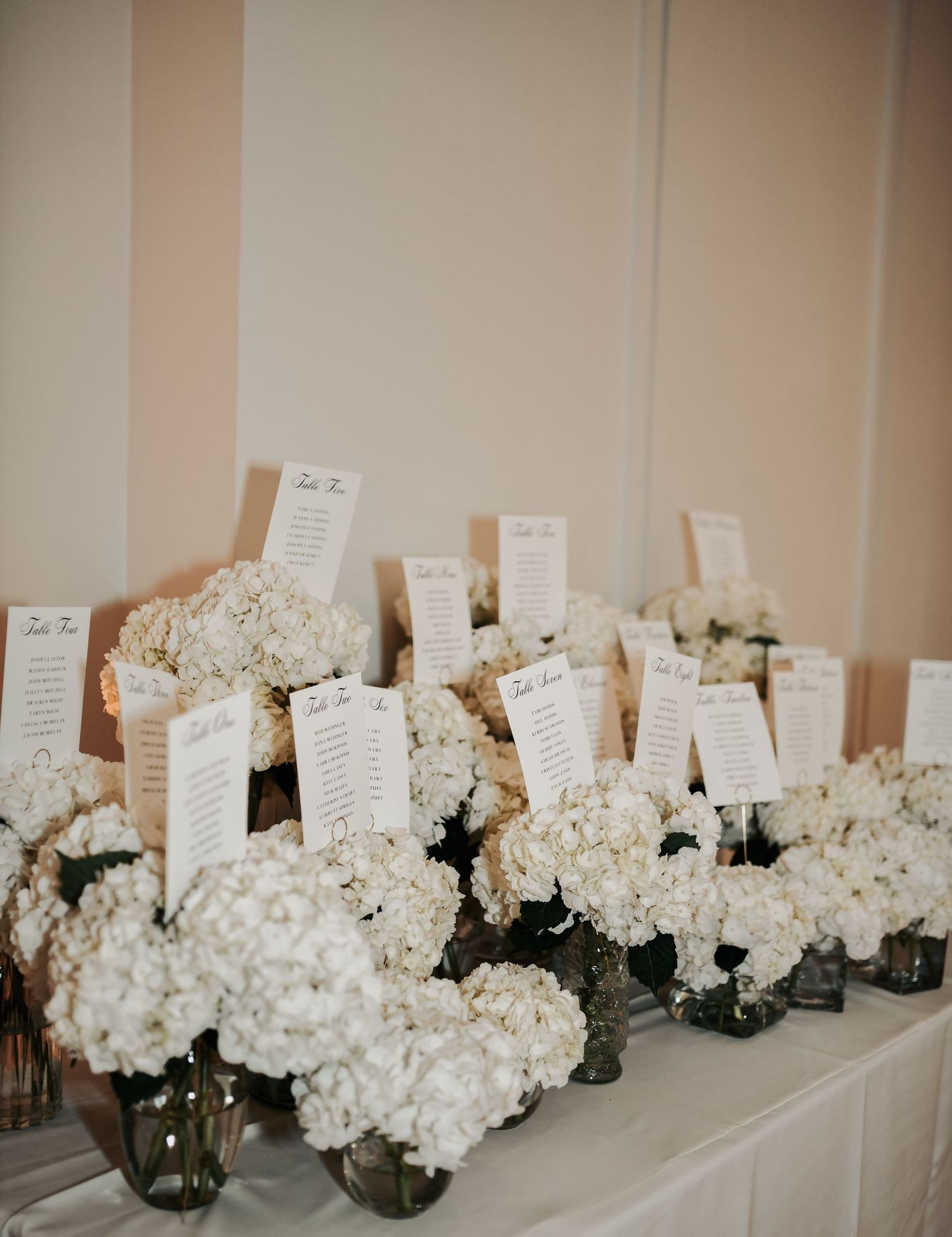 seating arrangements pinned into flower bouquets
