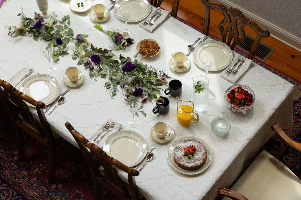Wedding brunch table set with flowers and place settings at River Dell Bed and Breakfast in Luray, Virginia