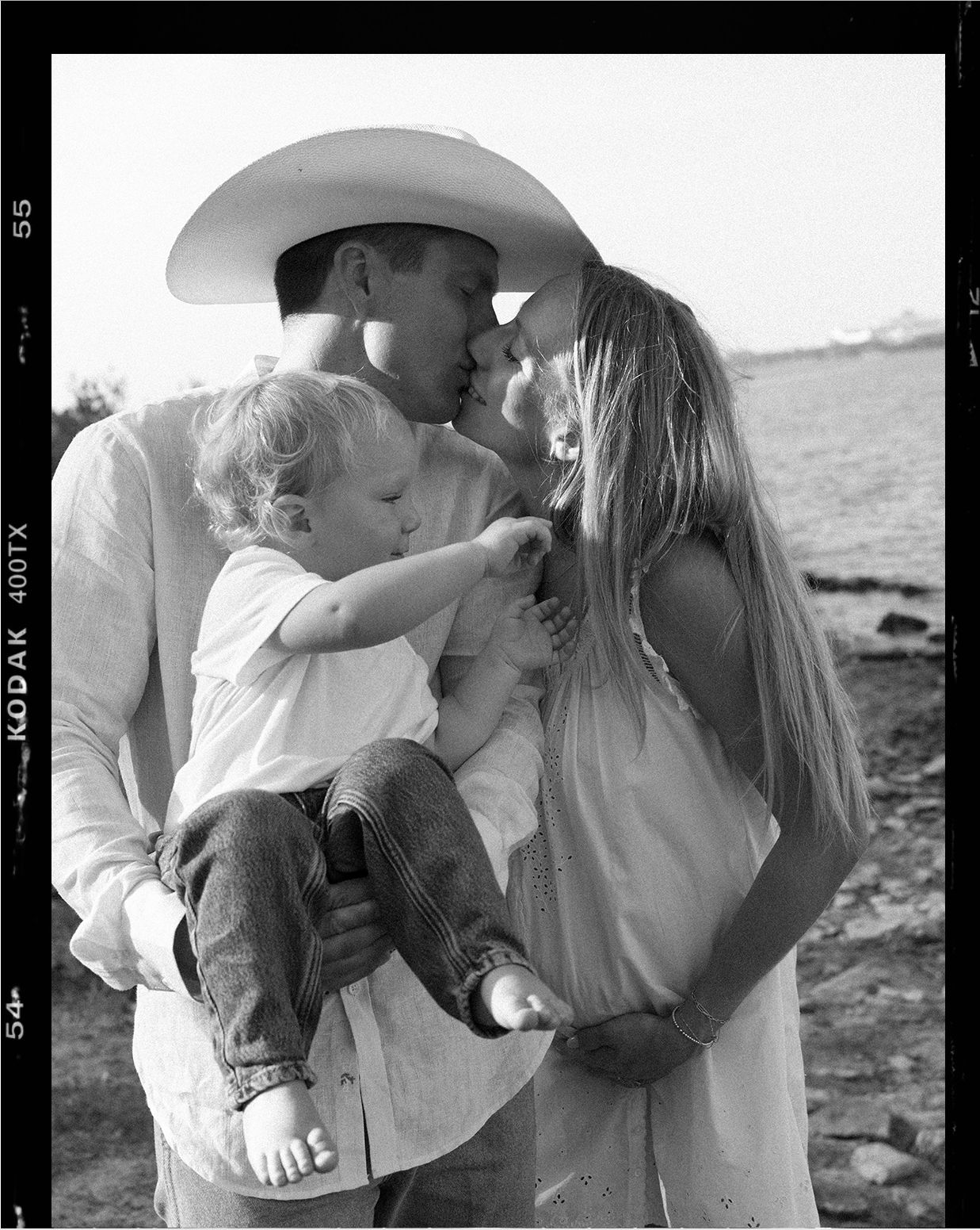 Black-and-white portrait of a mother holding her baby