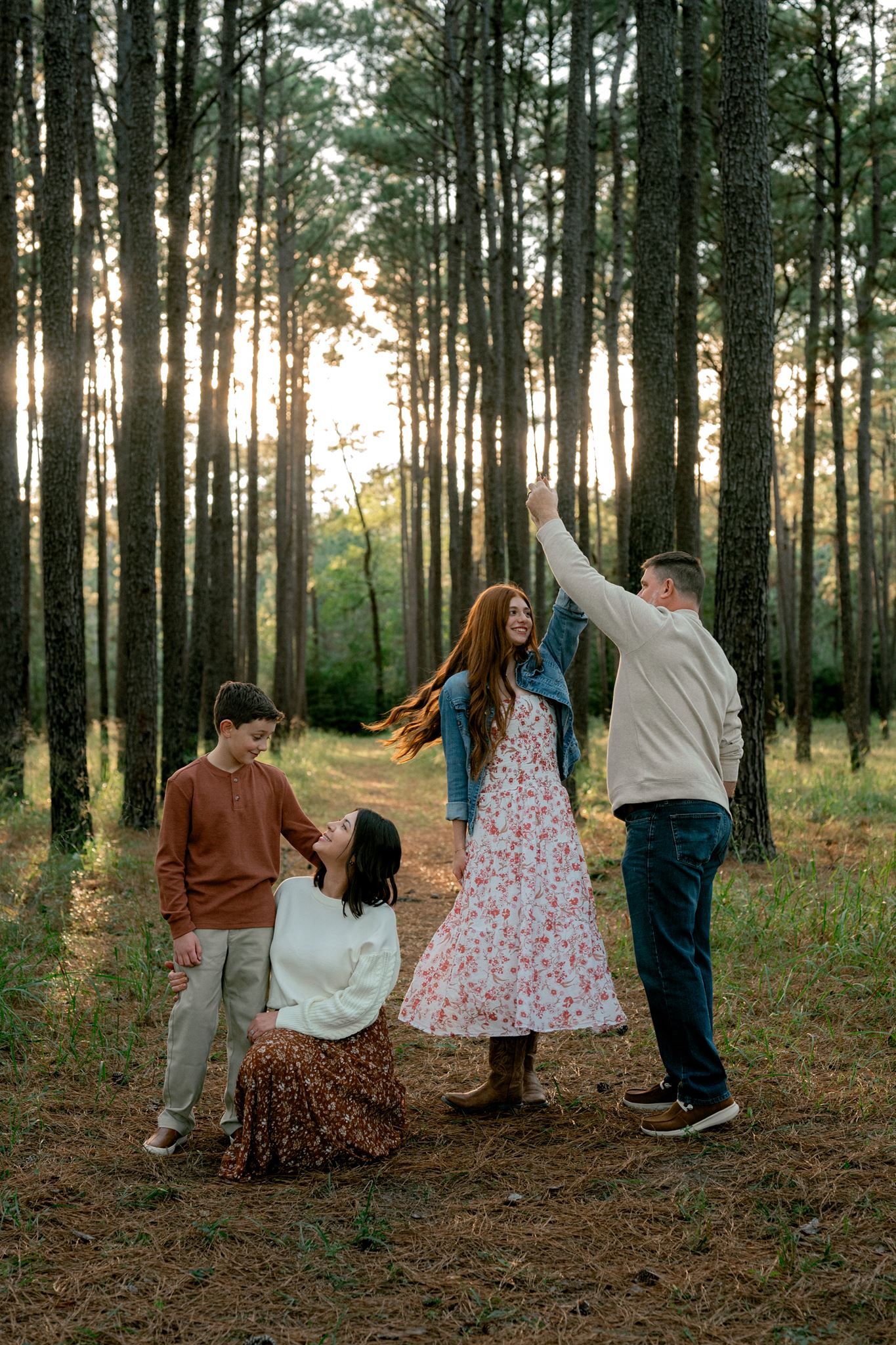 Individual family group photographed outdoors at W.G. Jones State Forest.