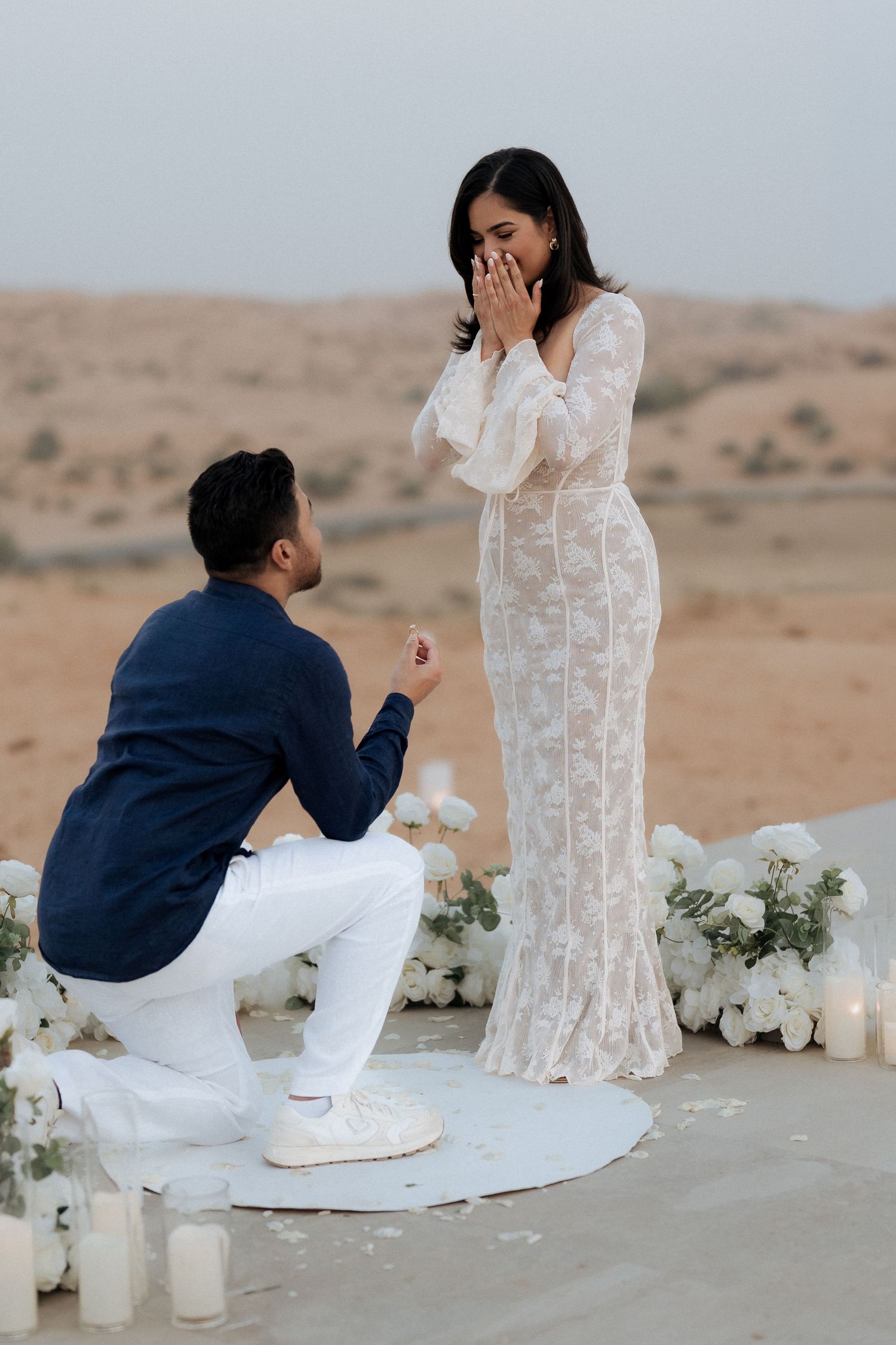 Surprise proposal photoshoot in Dubai desert – couple at sunset