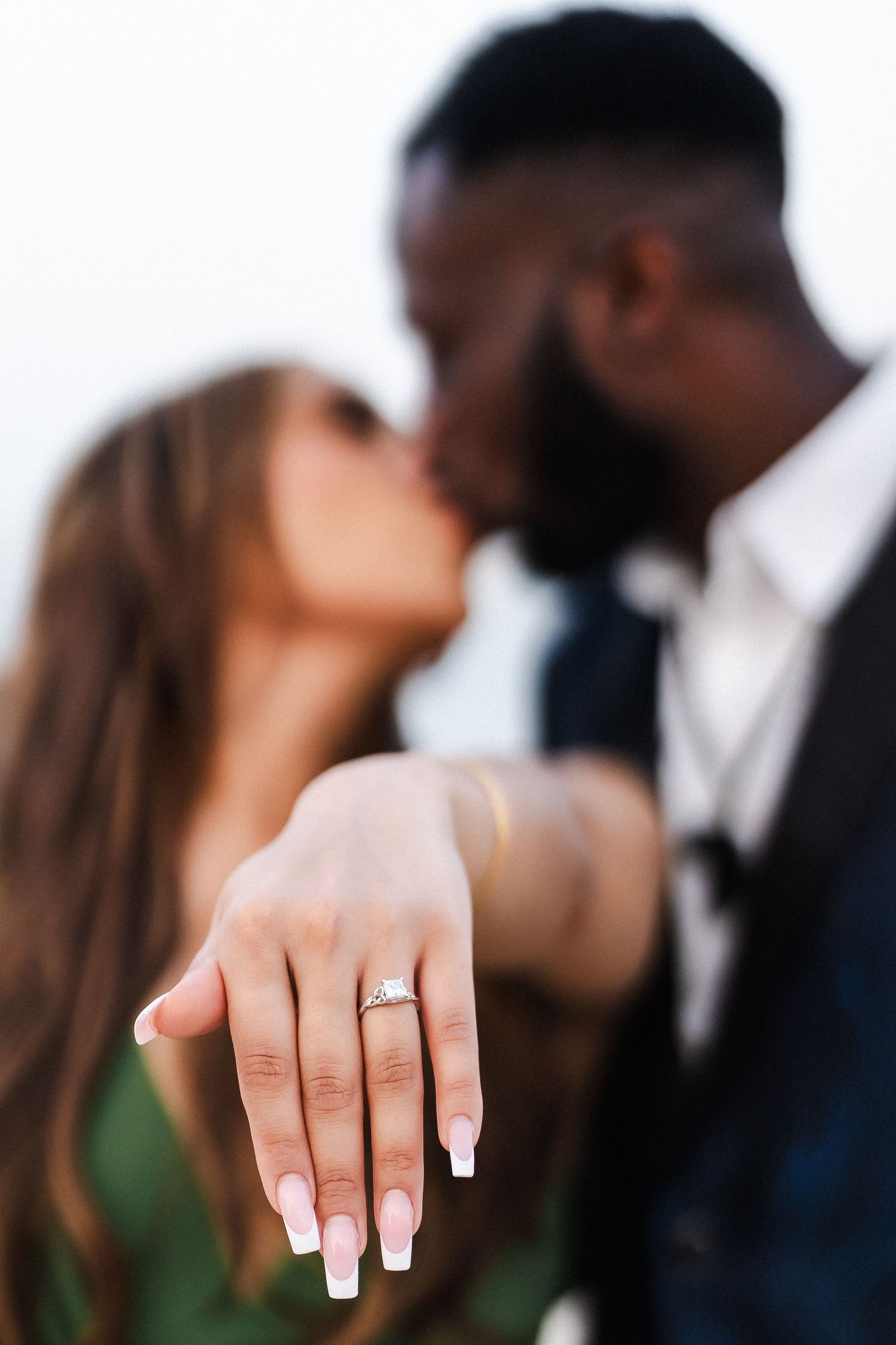 Newly engaged couple celebrating proposal on Dubai beach