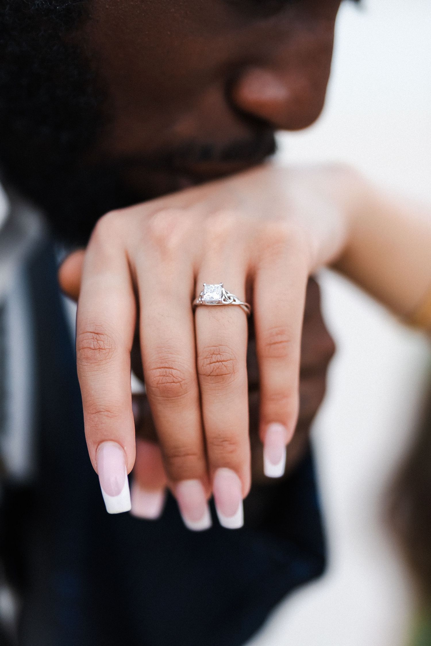 Proposal ring close-up during intimate Dubai beach engagement