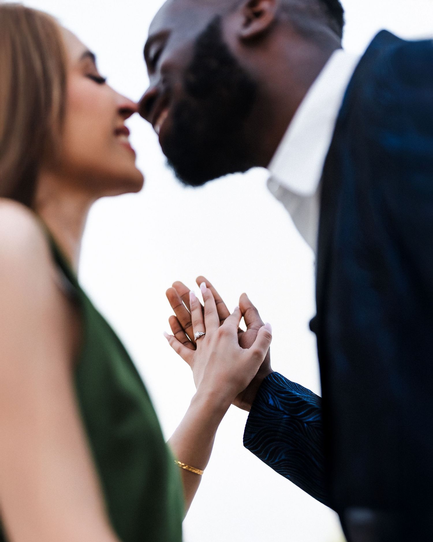 Close-up romantic proposal moment during Dubai beach photoshoot