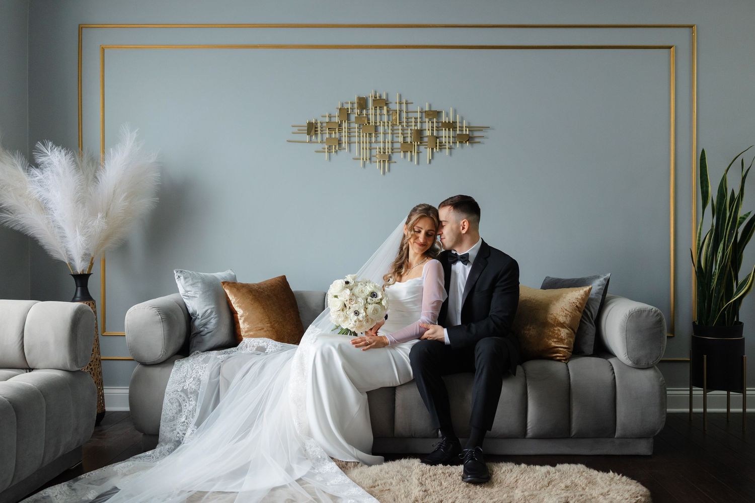 Bride and groom share quiet moment in living room before their wedding ceremony photographed by Tom Forrest Photography of Hudson, Ohio.