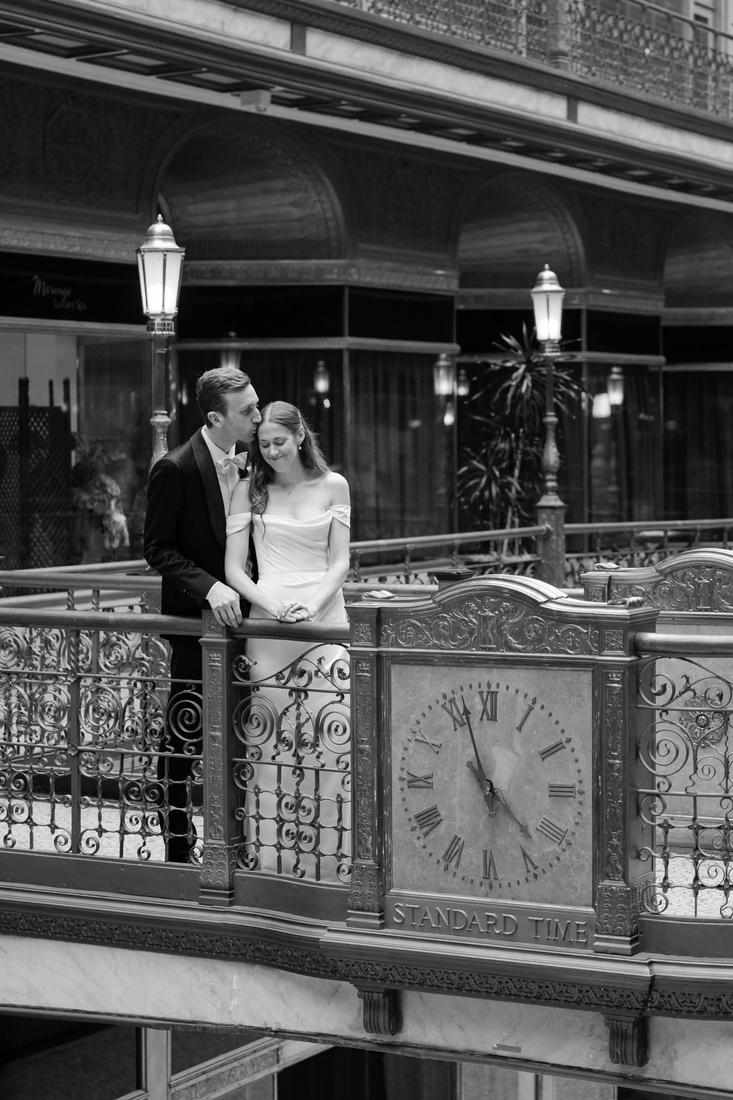 Bride and groom on their wedding day at the Hyatt Arcade in downtown Cleveland photographed by Tom Forrest Photography of Hudson, Ohio.