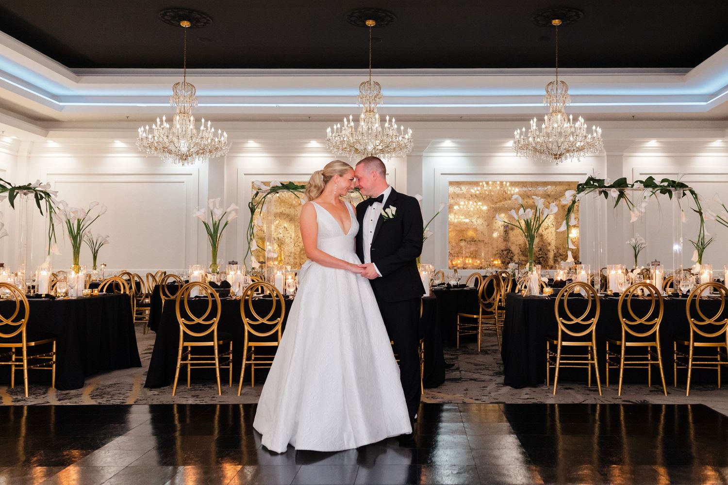 Bride and groom share moment on dance floor before wedding ceremony in Canton photographed by Tom Forrest Photography of Hudson, Ohio.