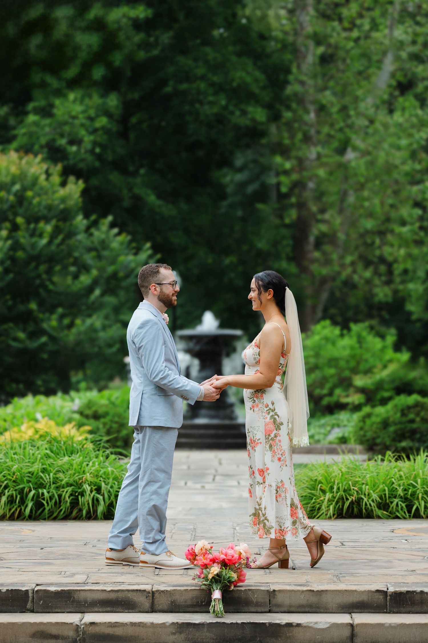Bride and groom after their wedding ceremony at the Cleveland Cultural Gardens photographed by Tom Forrest Photography of Hudson, Ohio.