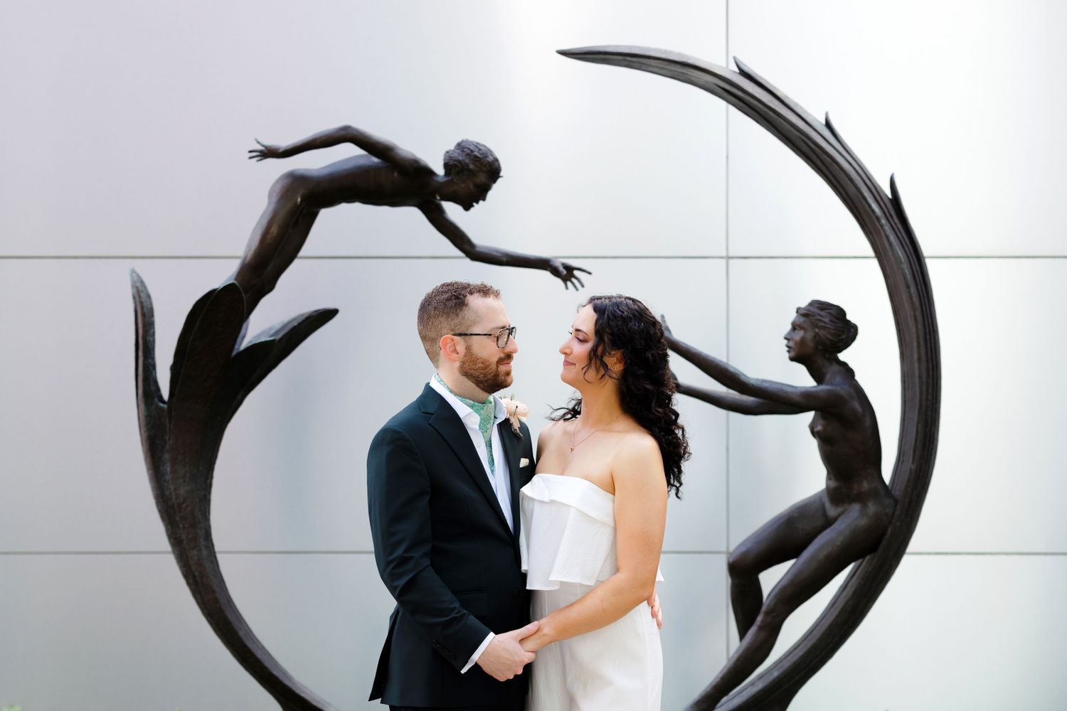 Newlyweds during their wedding reception at the Akron Museum of Art photographed by Tom Forrest Photography of Hudson, Ohio.