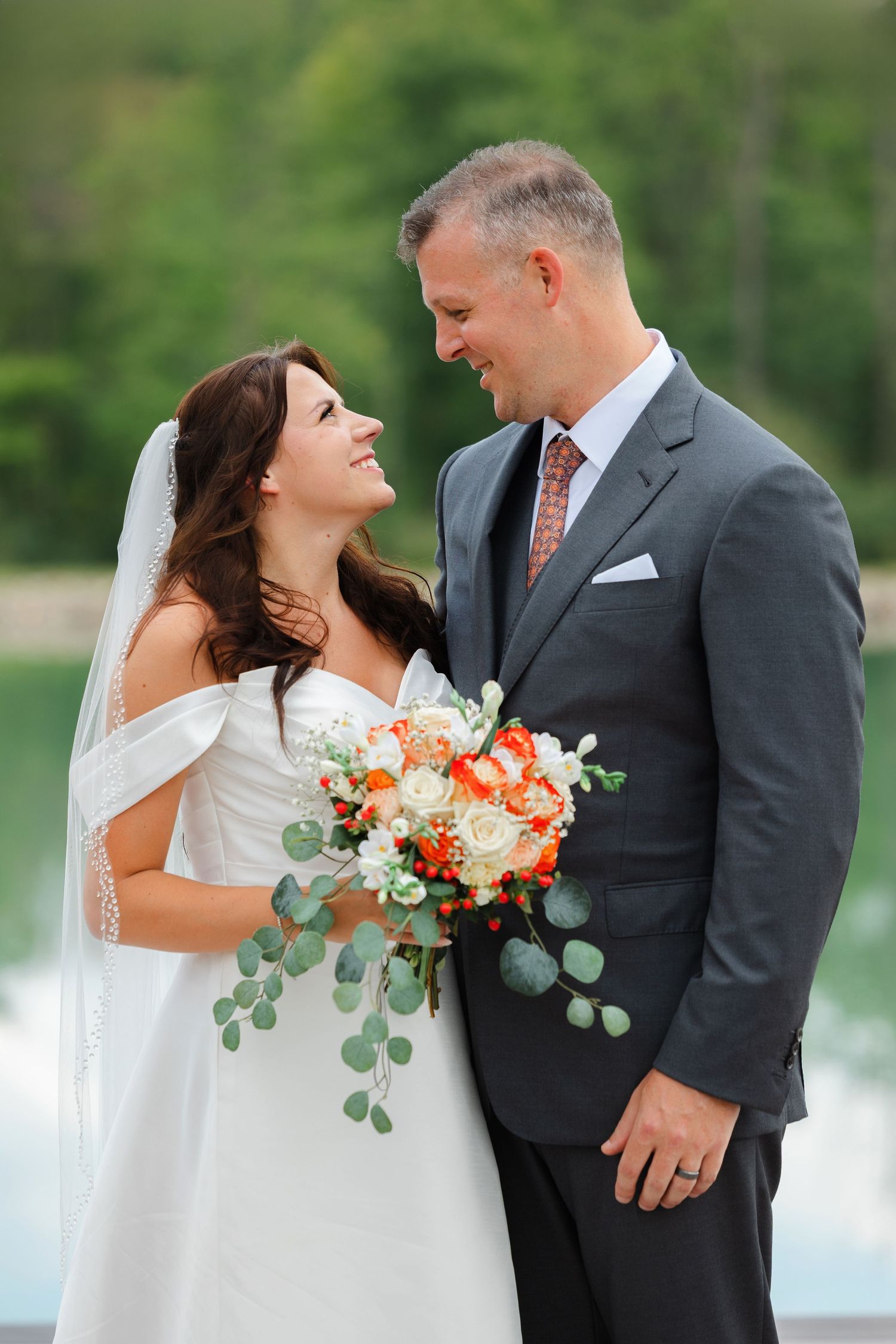 Newlyweds looking at each other after wedding ceremony photographed by Tom Forrest Photography of Hudson, Ohio.