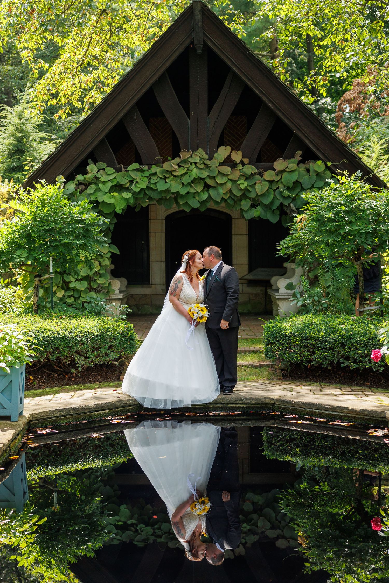 Bride and groom at Stan Hywet Hall and Gardens photographed by Tom Forrest Photography of Hudson, Ohio.
