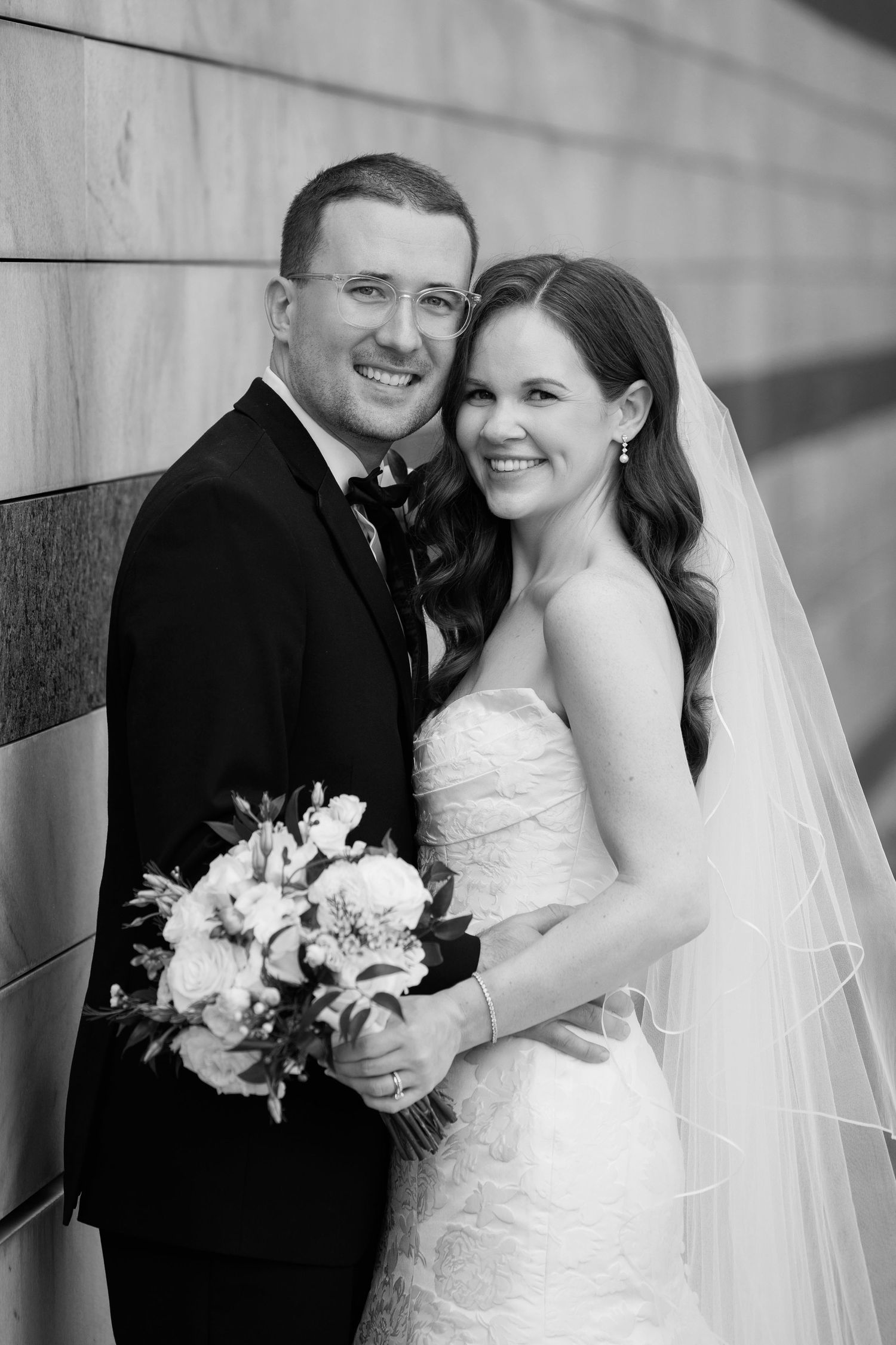 Bride and groom portrait outside Cleveland Museum of Art photographed by Tom Forrest Photography of Hudson, Ohio.
