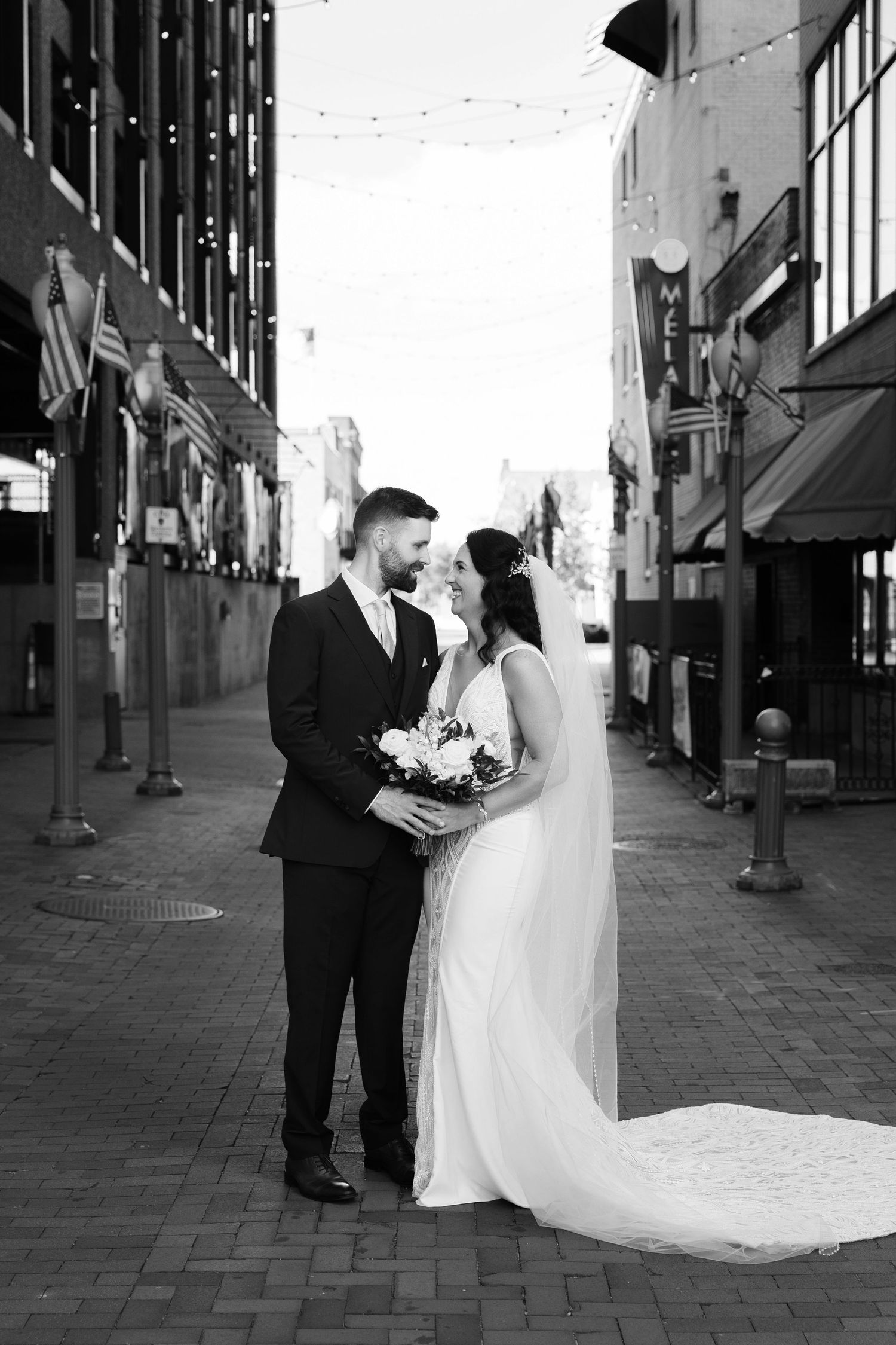 Bride and groom outside Historic Onesto in Canton photographed by Tom Forrest Photography of Hudson, Ohio.