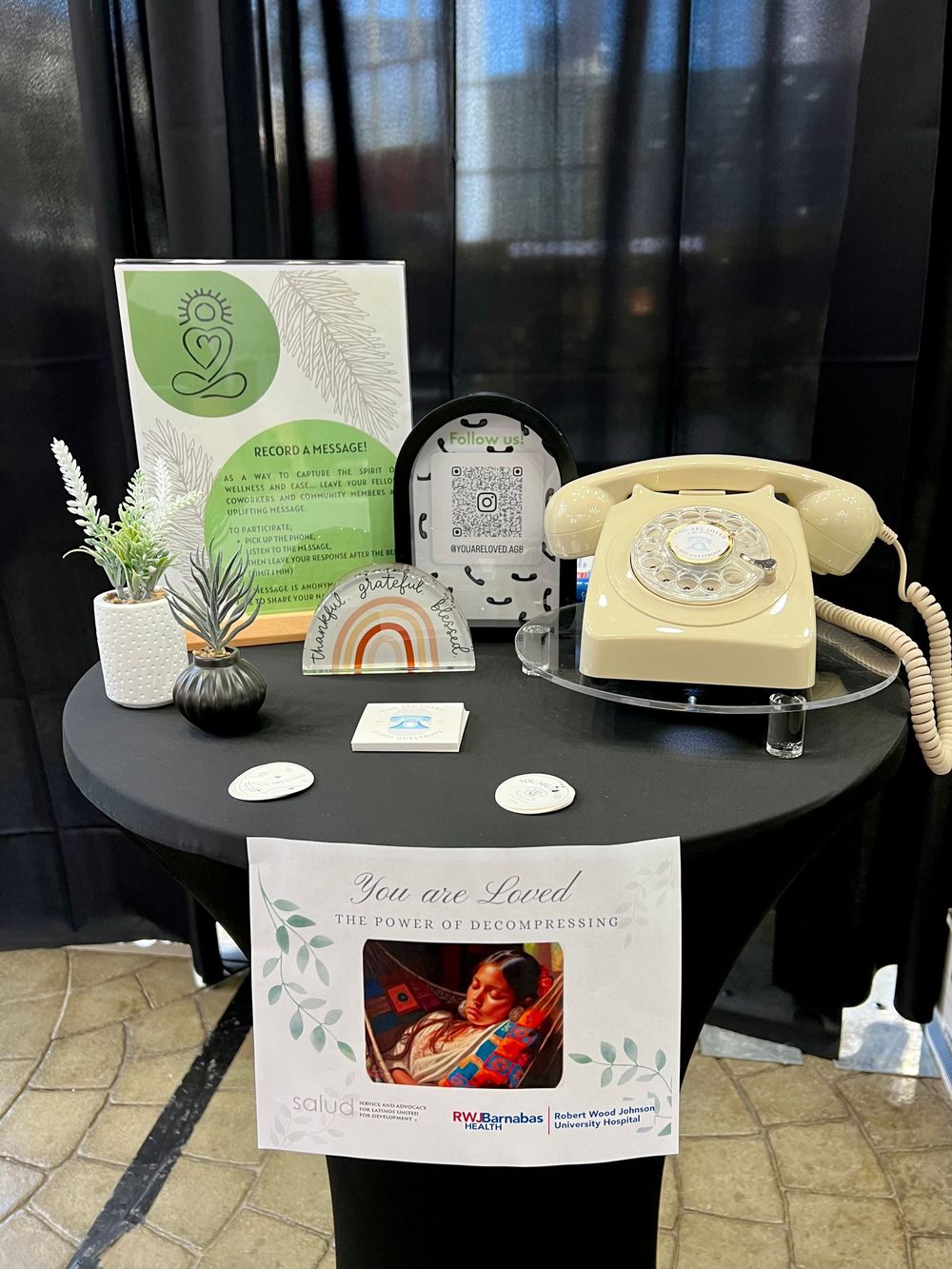 an audio guestbook set up with a beige rotary phone
