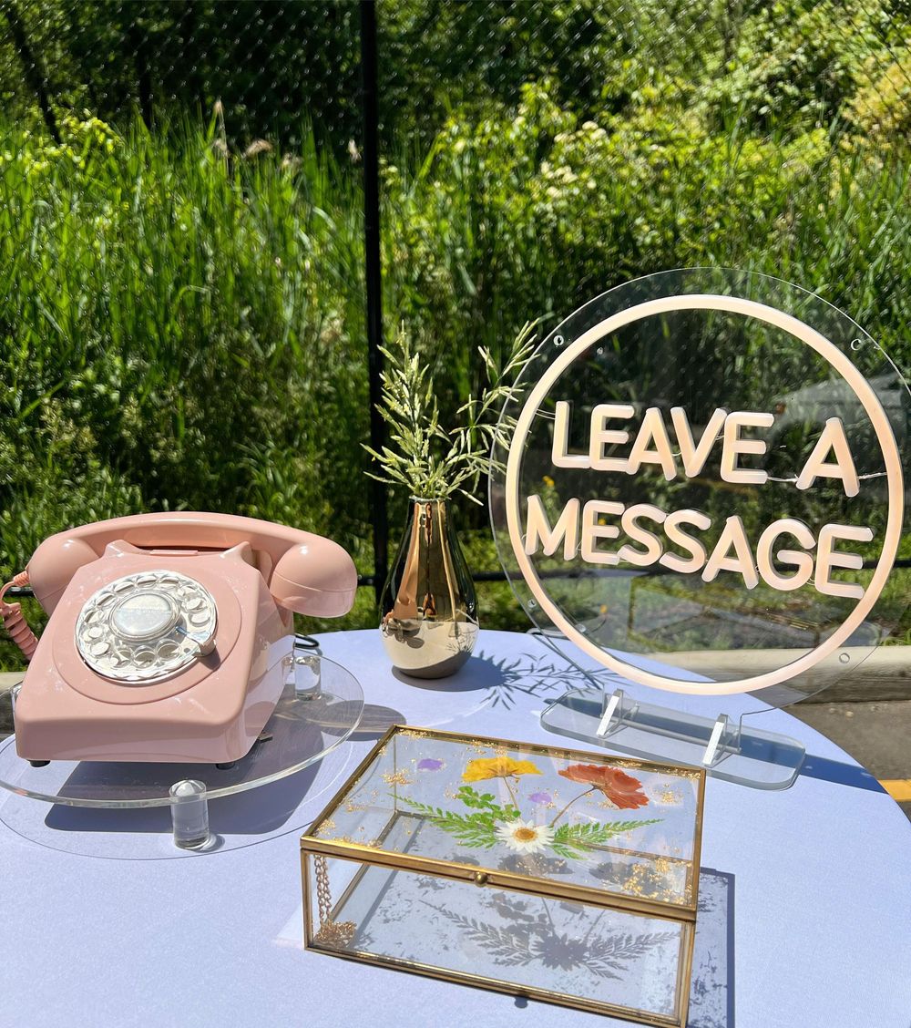 a pink rotary phone