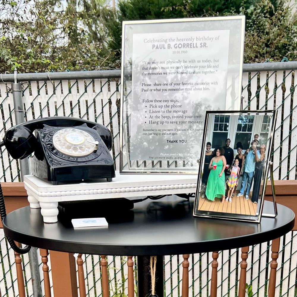 an audio guestbook set up with a black rotary phone