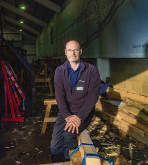 Sutton Hoo Longboat project - portrait of Norman Macritchie – seated. Health & Safety Advisor, Woodbridge, Suffolk