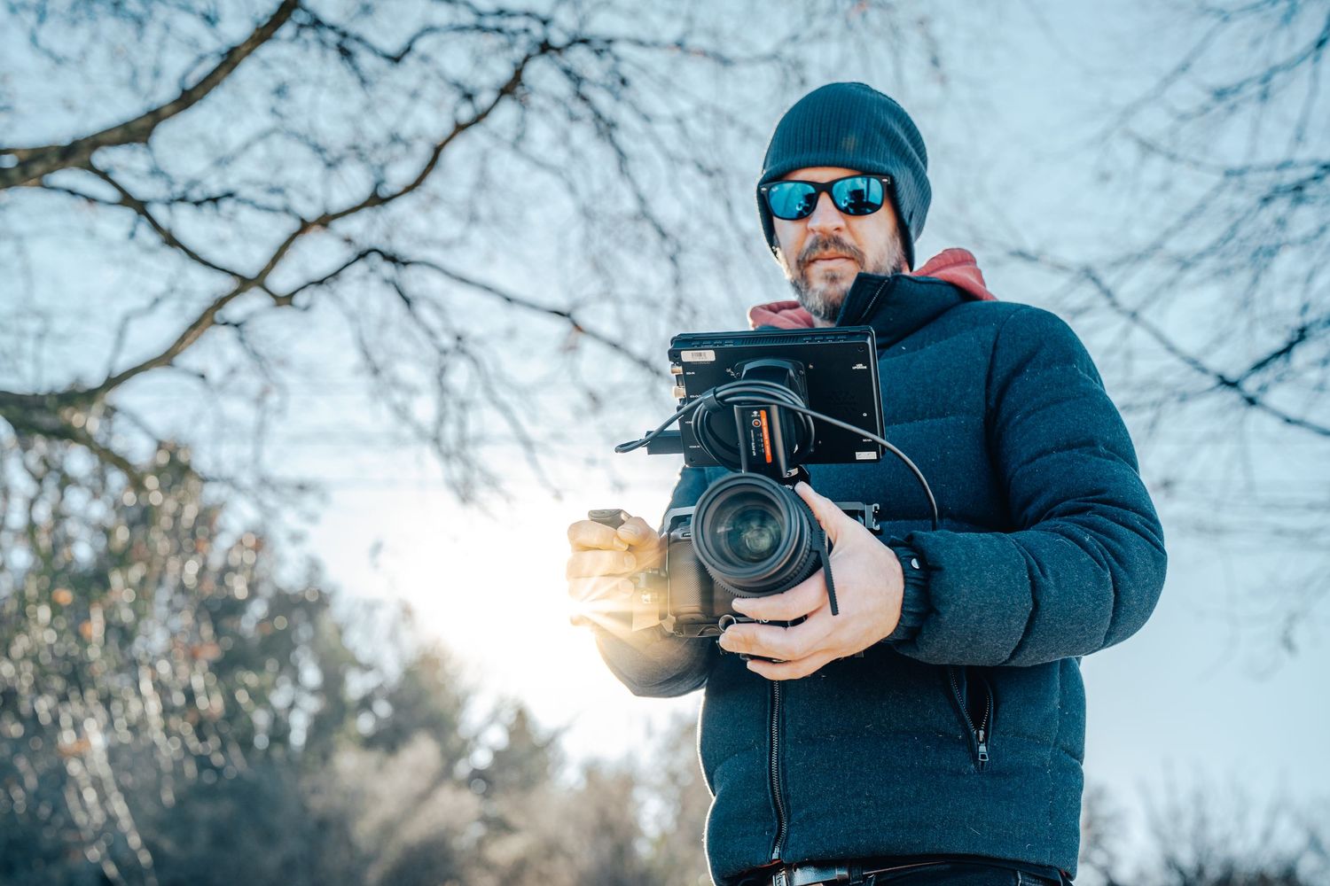 Professional camera gear being operated outdoors on a winter day.