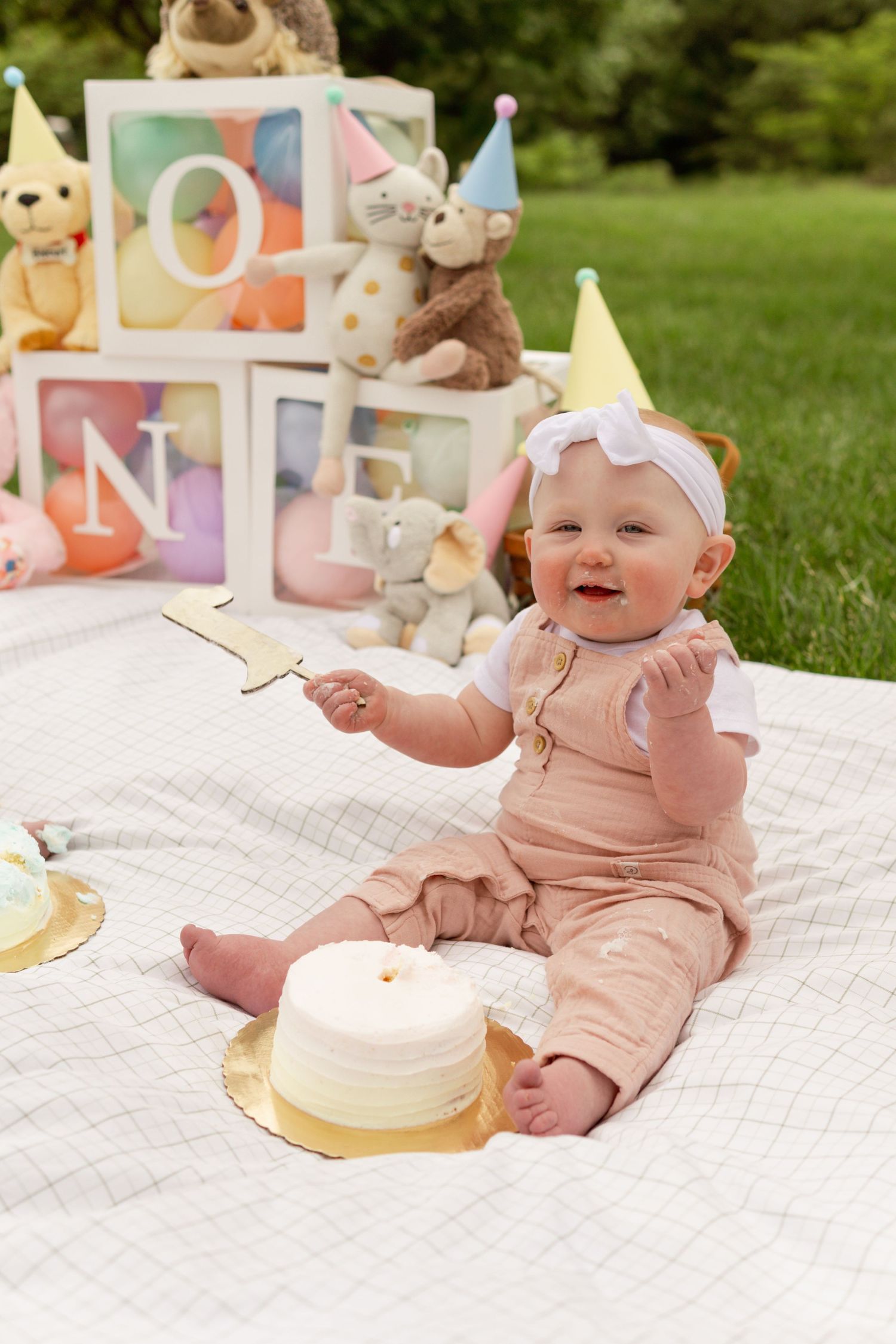 South Jersey photographer captures first birthday celebration with a cake smash at a park in Moorestown, NJ.