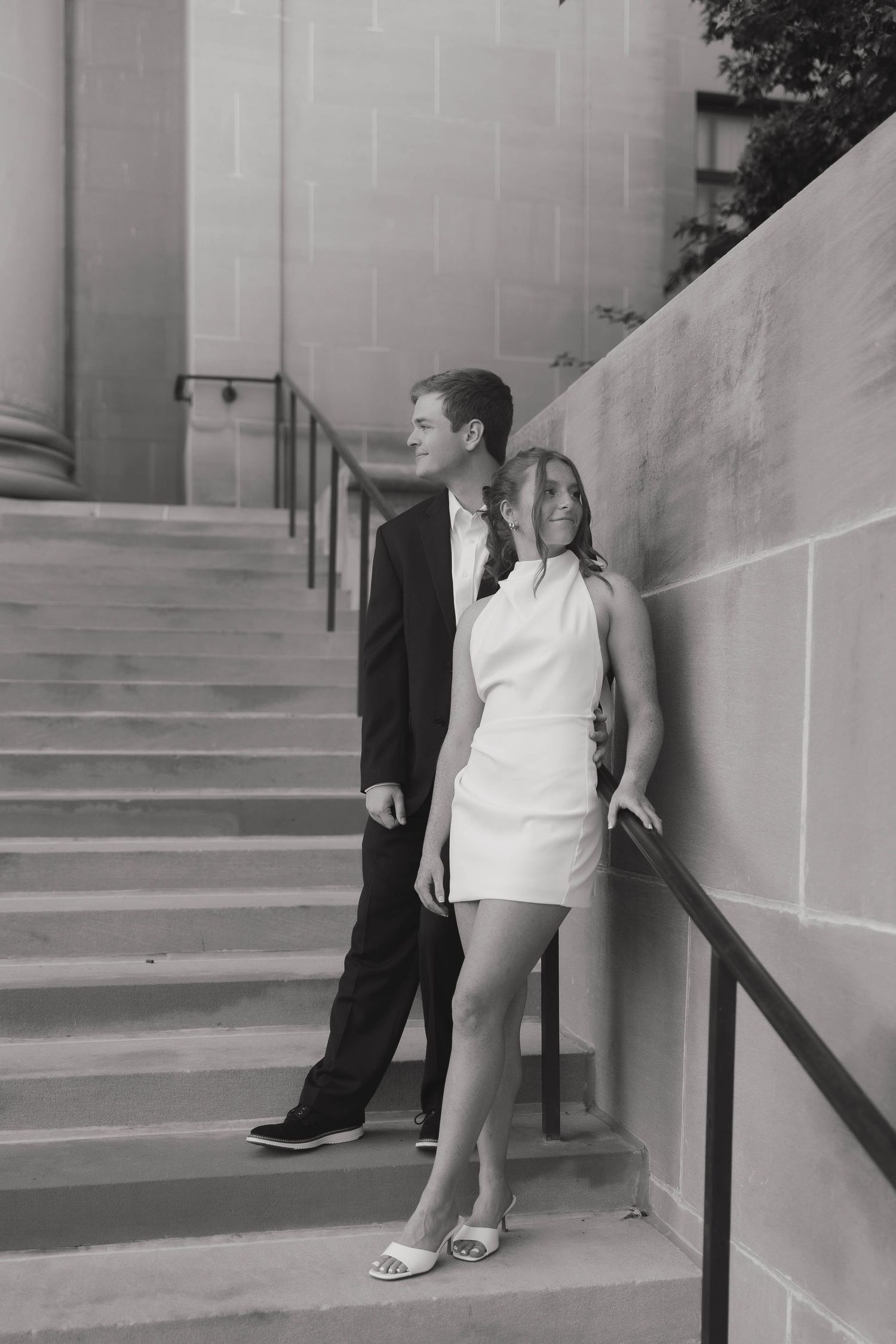 Black and white artistic photo series showing same woman in white dress leaning against walls on steps at different angles.