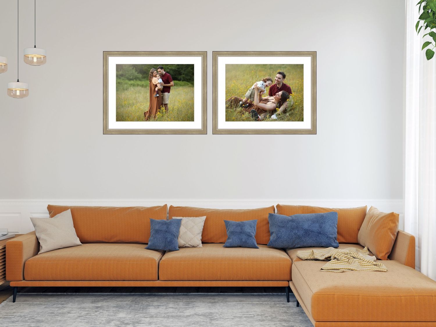 Brown leather sectional sofa with blue and white accent pillows in a modern living room with framed artwork.