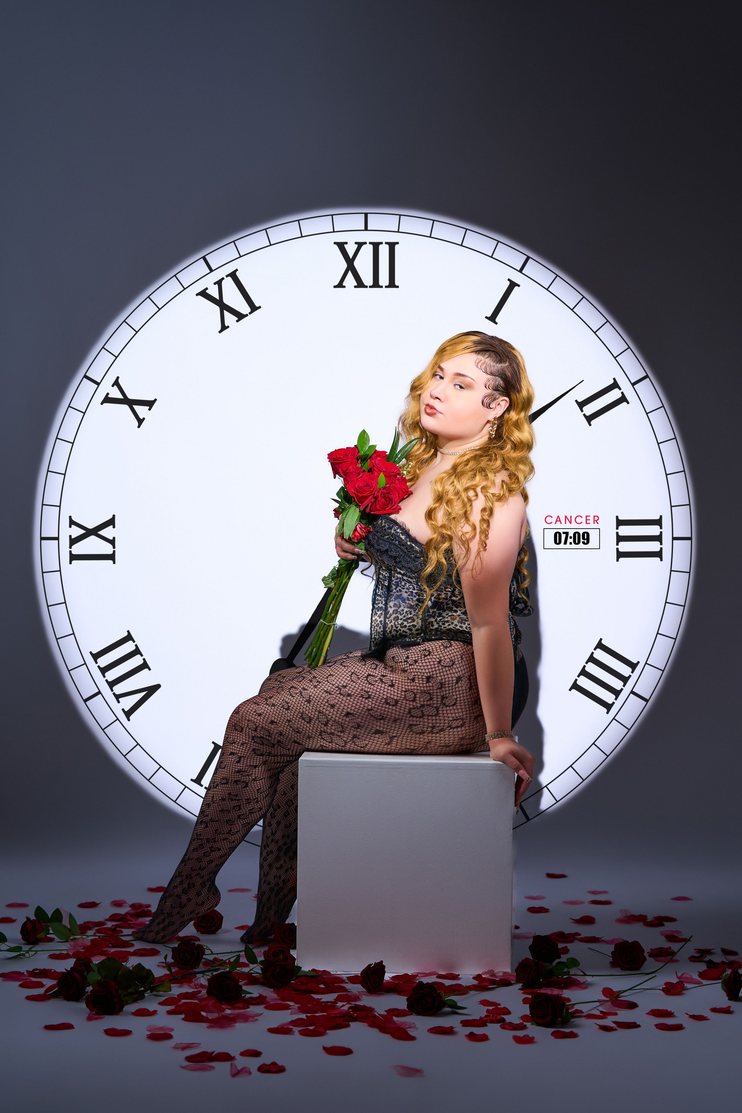 Dramatic photo series with large clock backdrop, roses, and romantic vintage styling.