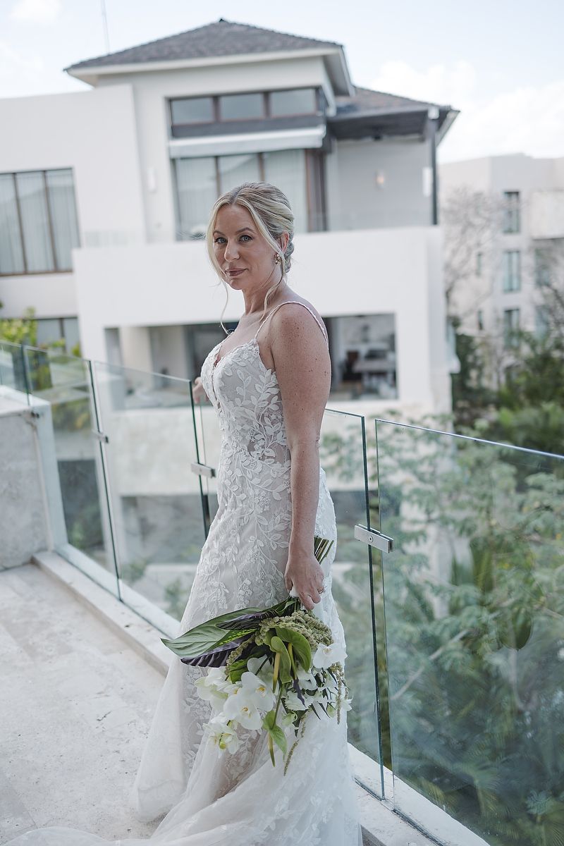 Bride portrait in wedding gown at Fairmont Mayakoba Riviera Maya wedding photographer.