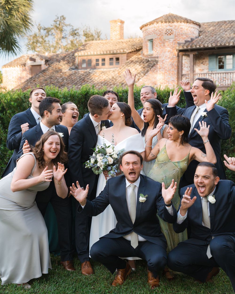 Wedding party members having fun striking silly poses together in a series of candid outdoor photos.