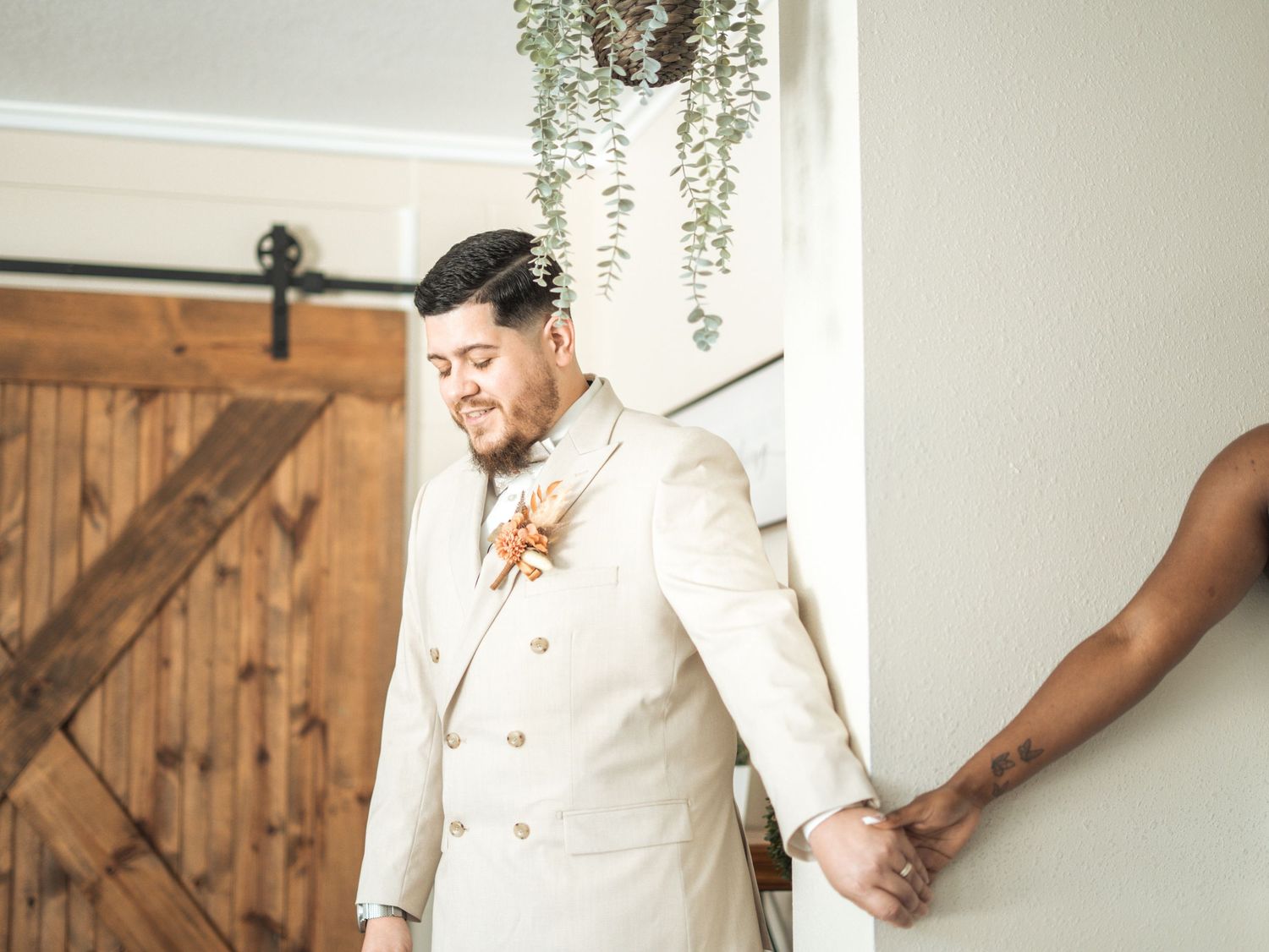 A collage of romantic wedding photos showing hands holding, wooden doors, and elegant white attire details.