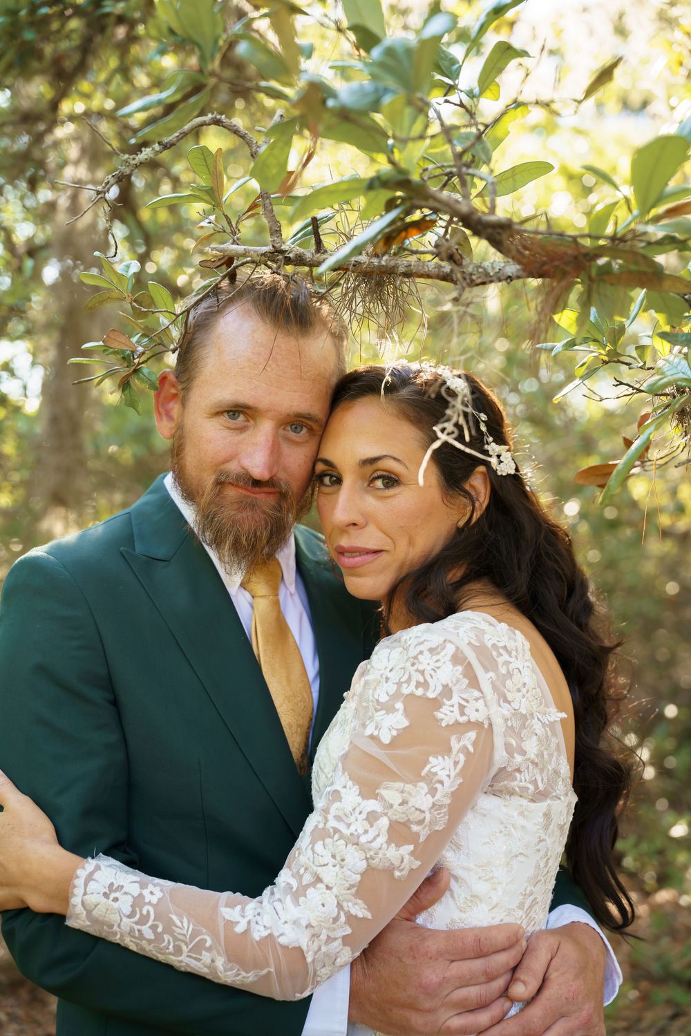 A series of intimate wedding portraits showing a couple in a forest setting with dappled sunlight and natural scenery.
