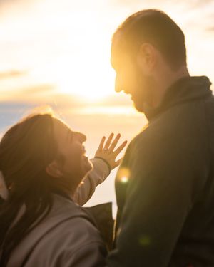 Proposal engagement couple sunset photo at Haleakala summit Maui Hawaii