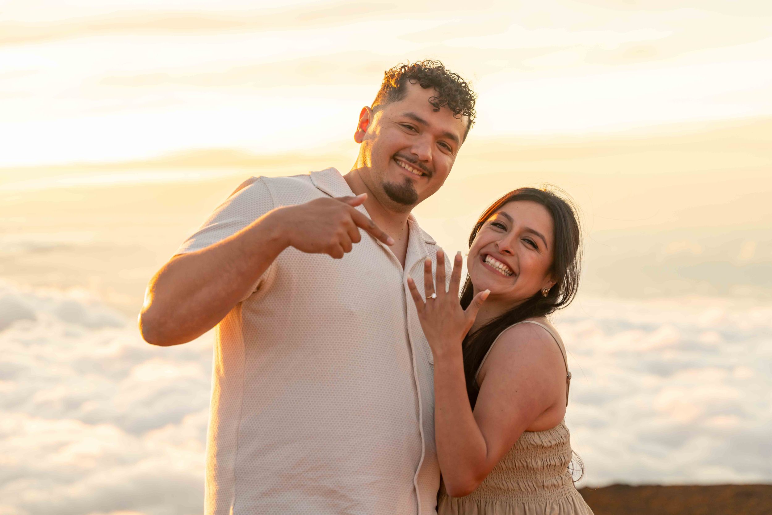 Proposal engagement couple sunset photo at Haleakala summit Maui Hawaii
