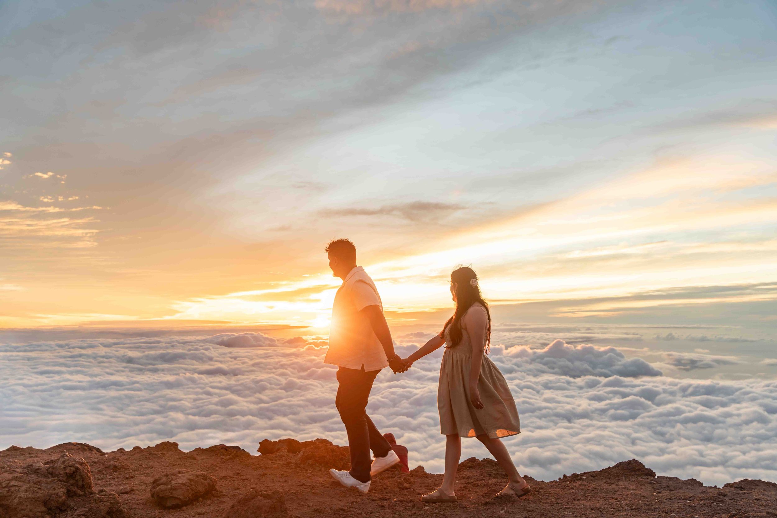 Proposal engagement couple sunset photo at Haleakala summit Maui Hawaii