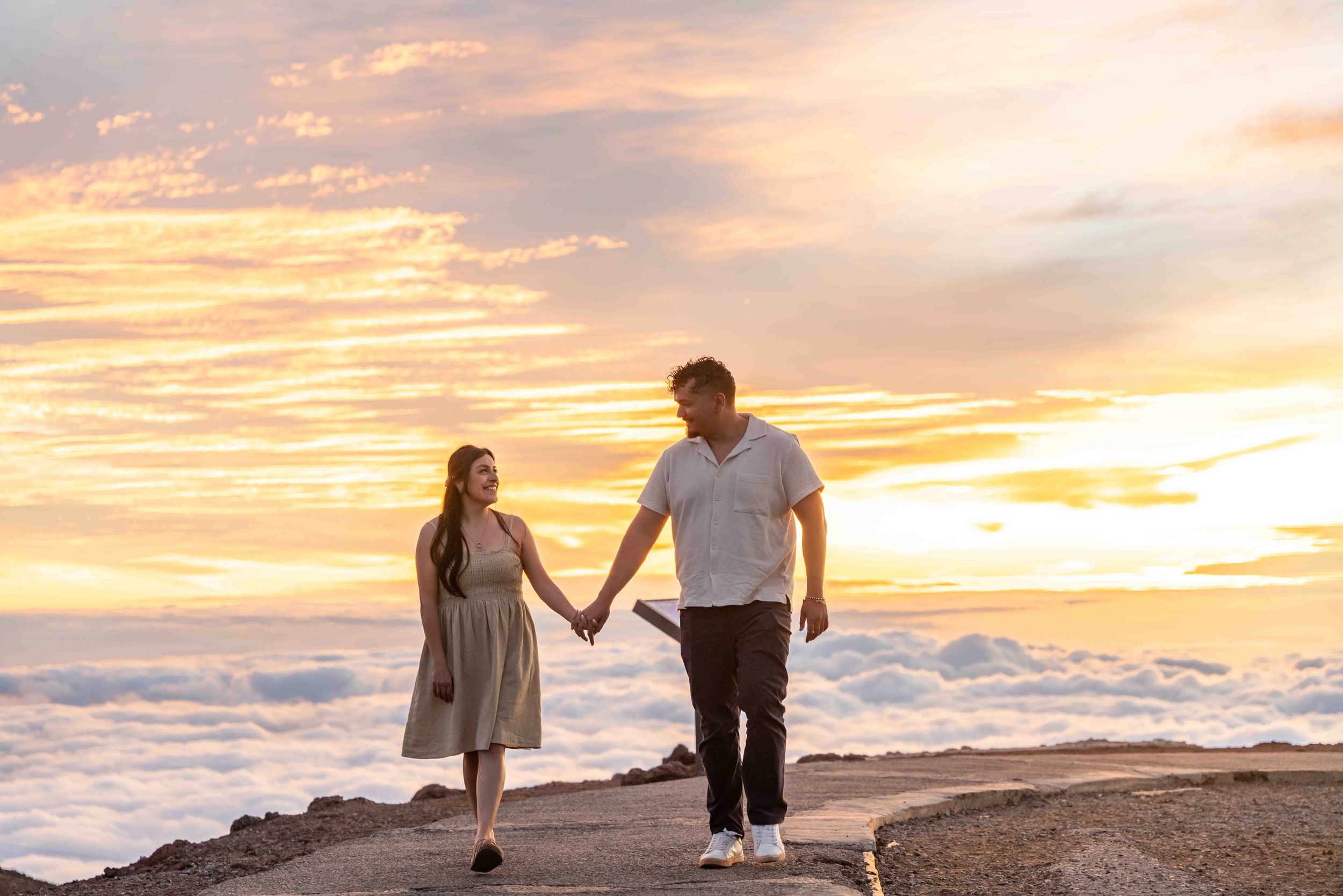 Proposal engagement couple sunset photo at Haleakala summit Maui Hawaii