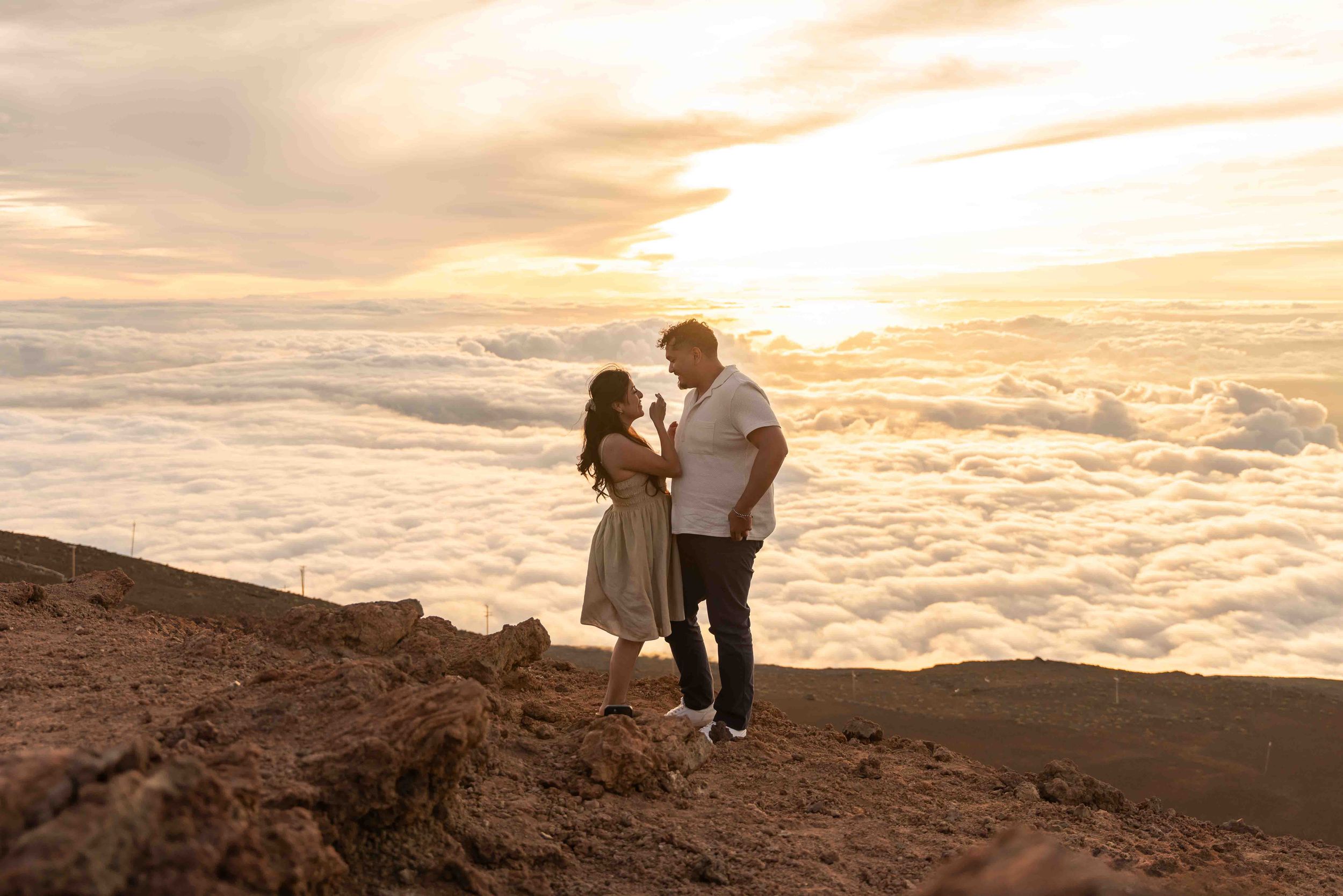 Proposal engagement couple sunset photo at Haleakala summit Maui Hawaii