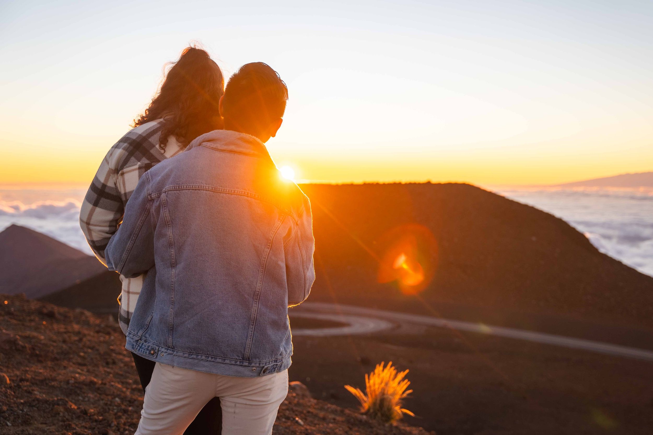 Proposal engagement couple sunrise photo at Haleakala summit Maui Hawaii
