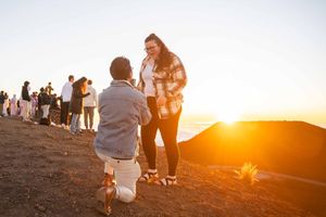 Proposal engagement couple sunrise photo at Haleakala summit Maui Hawaii