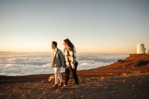 Proposal engagement couple sunrise photo at Haleakala summit Maui Hawaii