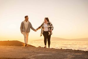 Proposal engagement couple sunrise photo at Haleakala summit Maui Hawaii