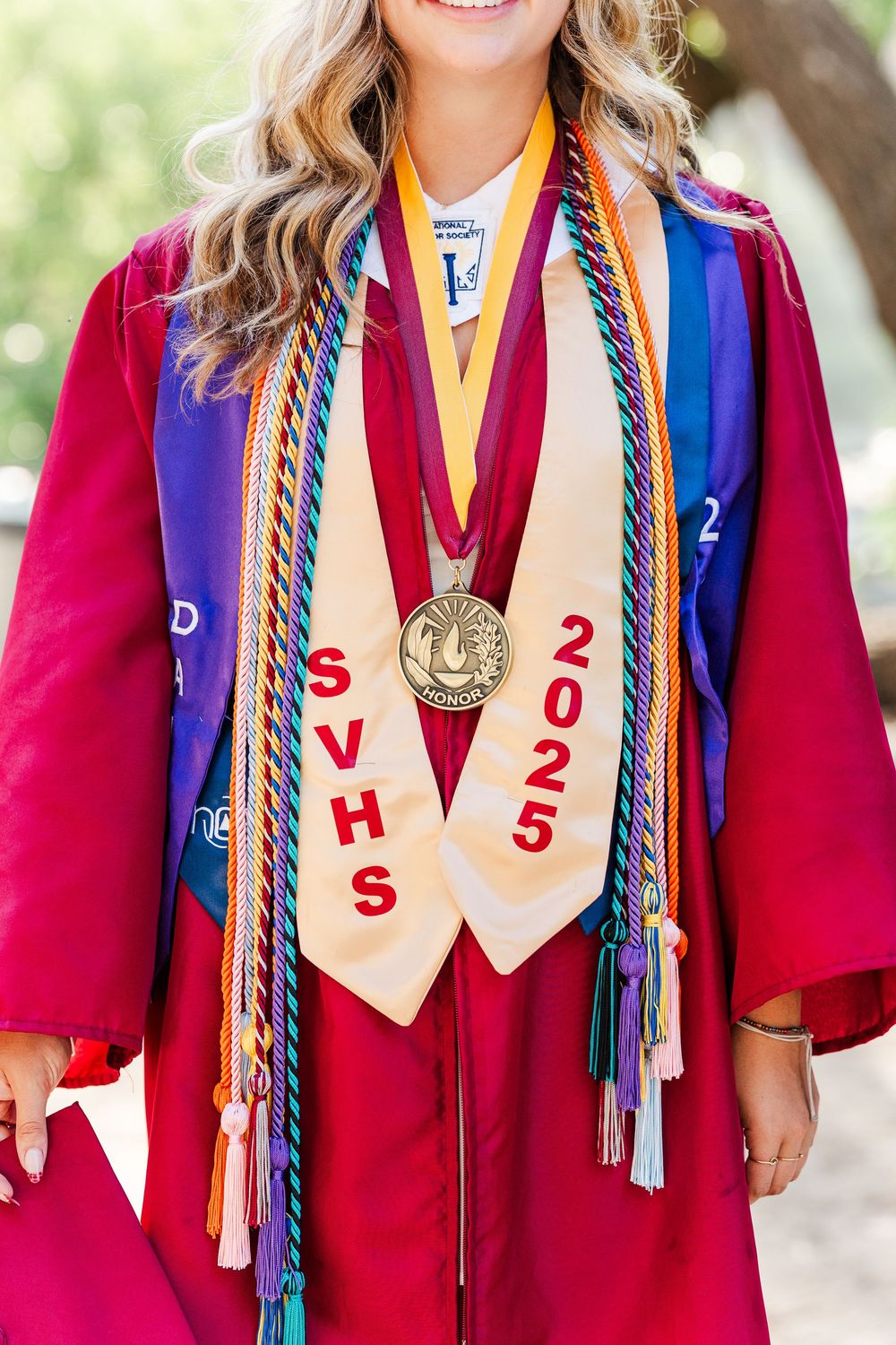 Simi Valley high school graduate posing at Corriganville Park with scenic trails and natural light for outdoor graduation portraits.