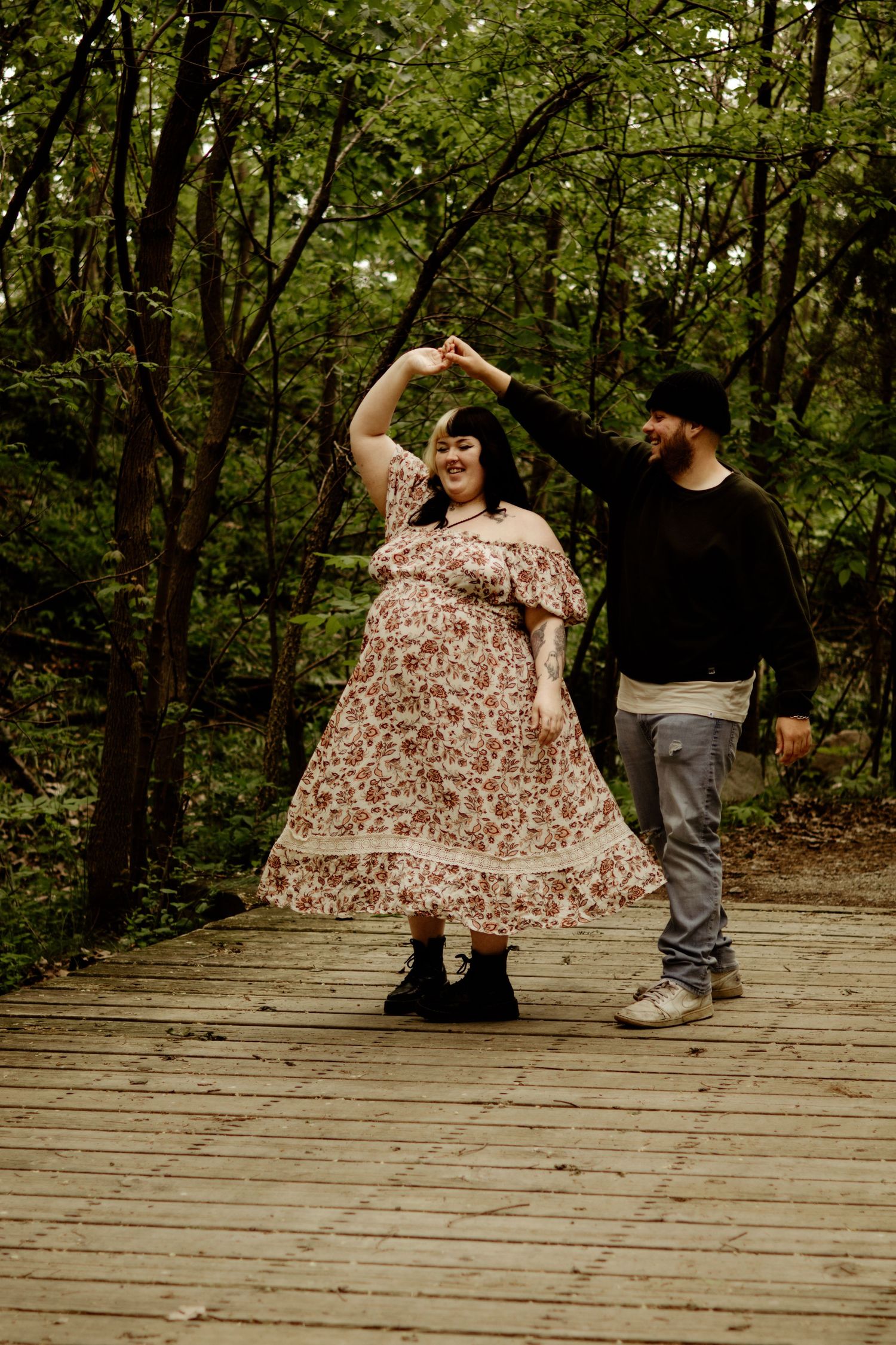 expecting couple dancing